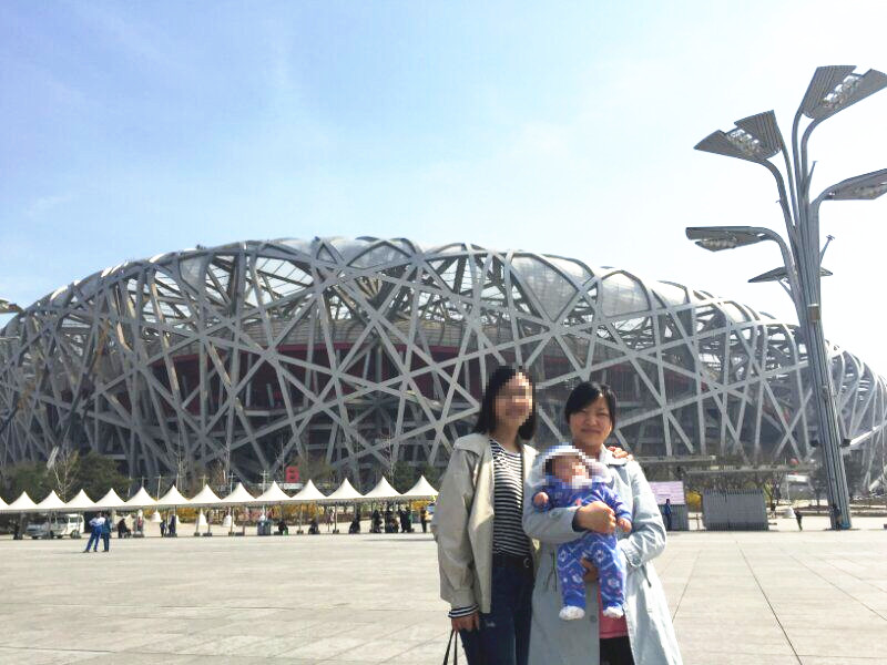黄晓萍抱宝宝 马赛克.jpg